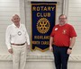 Dr. Slocum Howland and President Josh Bryson. Along with its other scholarships, Rotary will begin awarding a $1000 scholarship each year to one student who will attend UNC. The award will bear Dr. Howland's name.